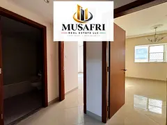 NO COMMISSION/1MONTH FREE/WITH WARDROBE/GYM/AL TAWUUN SHARJAH