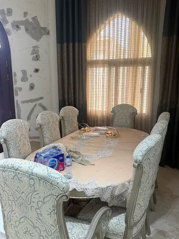 8-Seater Round Dining Table with Upholstered Chairs - Cream/Light Blue