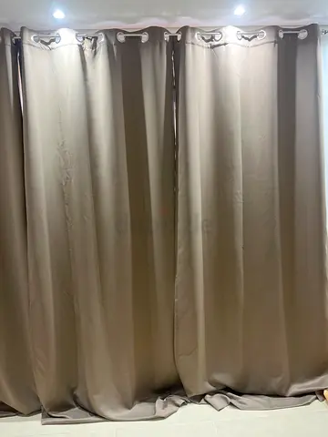 Brown blackout curtains with metal eyelets - single panel (good condition)