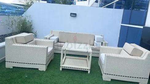 Wicker Outdoor Seating Set with Sofa, Armchairs, and Table