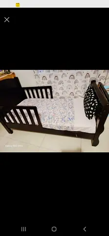 Wooden crib with mattress is on sale perfect condition