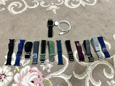 Apple Watch Ultra 49mm Titanium + Charger cable & 12 Extra Straps/Bands