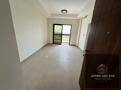 Luxury 1BHK first tenant for annual rent in Al Jurf 2, Ajman. master BR, 2 bathrooms, balcony, open view, central AC, large kitchen, prime location .