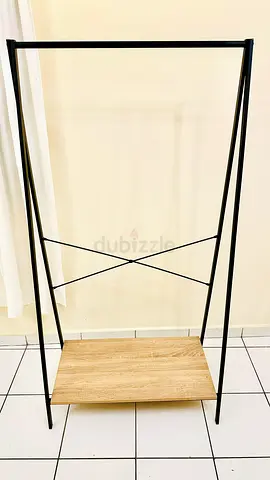 Minimalist Black Metal Clothes Rack with Wooden Shelf