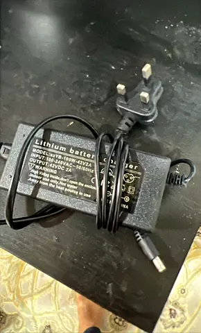 Universal DC Power Adapter / Charger with UK Plug (12V 2A) - Good Working Condition