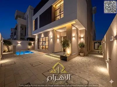 With a down payment of less than 10%, own a 5-master-bedroom villa in Al Helio 2. Freehold ownership, located on a main road. Competitive price, inclu