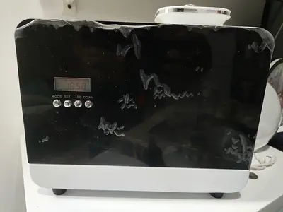 Used Black & White Ultrasonic Humidifier with Digital Display