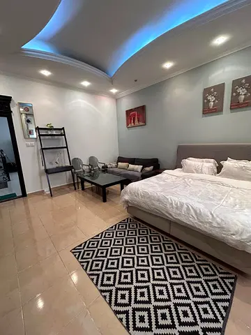 master bedroom with private bathroom in a villa central dubai