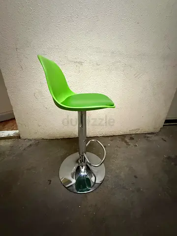 Green rotating adjustable height bar stool with chrome base