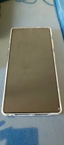 S25ULTRA smartphone in clear protective case - good working condition - unnoticed small scratche