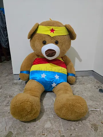 Large brown teddy bear in superhero costume - good condition