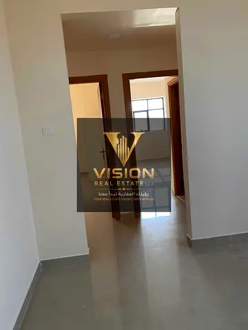Two-bedroom apartment with a living room for rent in Salama, next to Khalifa Hospital – AED 34,000 per year.