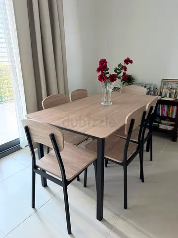 6-seater dining table set with wooden top and metal legs