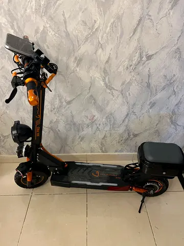 Electric kick scooter - well maintained, folding, with extra seat
