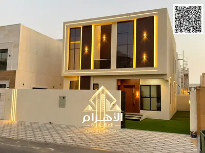Modern villa located directly behind the service area, featuring a spacious outdoor seating area. Lifetime freehold ownership; situated near Sheikh Mo