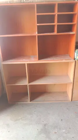 Wooden bookshelf/storage unit with multiple compartments - used