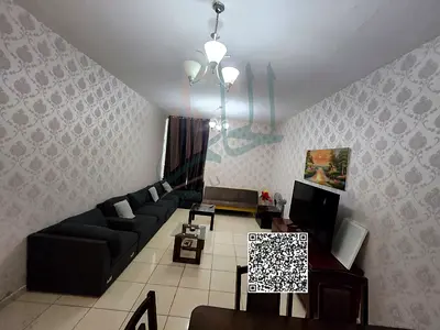 Furnished one-bedroom apartment with a living room in Orient Towers.