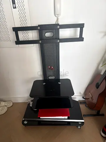 Black mobile TV stand with shelves and wheels - moveable good condition