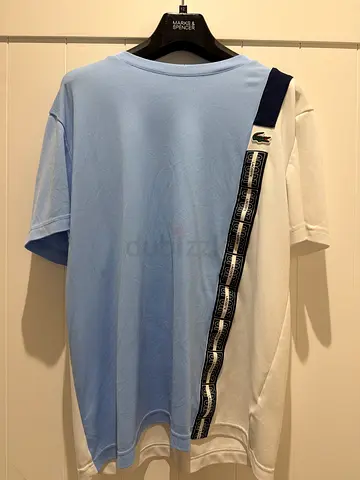 Lacoste light blue & white short sleeve polo-style T-shirt, size M