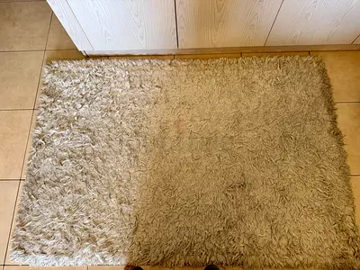 Beige shaggy area rug - good condition, 1.5 x 1.2 m (approx)