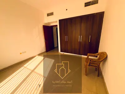 Spacious one-bedroom apartment with a living room, located on Sheikh Khalifa Street next to Al-Futtaim.