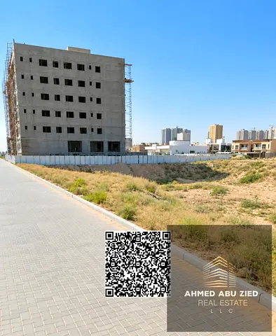 Residential and commercial land for sale in Al Aaliyah, Ajman (G+5)—the first lot on the main street, across from Al Bahia