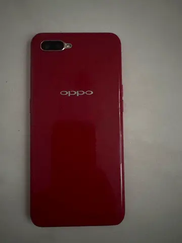 Red OPPO smartphone in good working condition