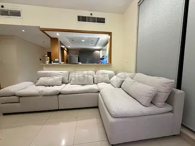 Light grey L-shaped fabric sectional sofa, good condition