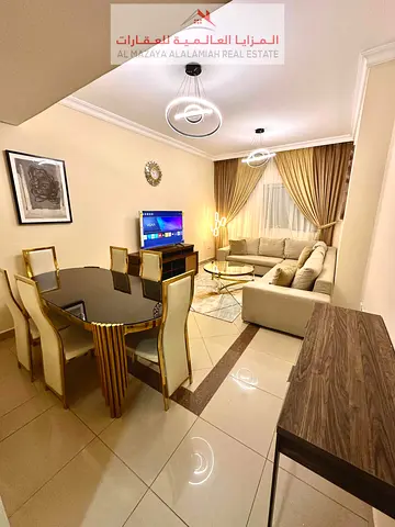 Super Deluxe Fully Furnished 3 Bedroom Apartment with Living Room, Balcony and Maid Room for Monthly Rent in Al Taawun