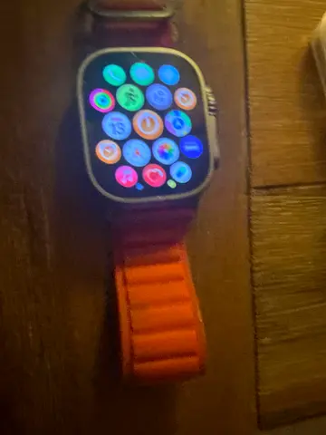 Used Apple Watch with orange sport band - working condition. The original Apple Watch Ultra 1