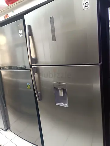 Samsung stainless steel refrigerator with 10-year inverter warranty - good condition