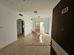 Two-bedroom apartment with a living room, open view, balcony, free parking, and one month free. Conv