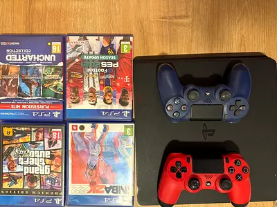PS4 Slim 500GB + 2 controllers + 4 Games- Excellent Condition
