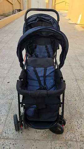 Used double stroller in good condition - compact fold