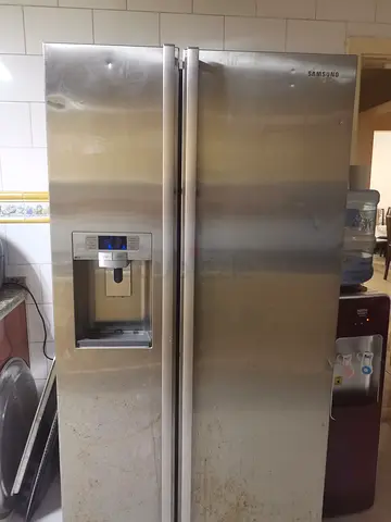 Samsung Side-by-Side Refrigerator with Water/ Ice Dispenser - Stainless Steel