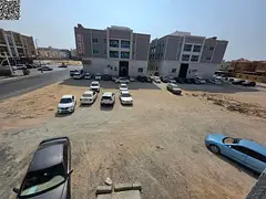 Land for sale, 17,000 sq ft, directly on Al Talah Street and Al Shurooq Mall, in a prime location in