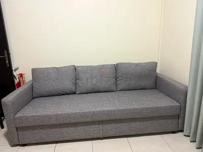 IKEA Grey fabric sofa with under-seat storage - convertible lounge bought it 2199 aed sold 700