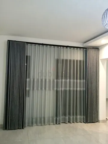 Full-length grey fabric curtains with sheer inner panel - new