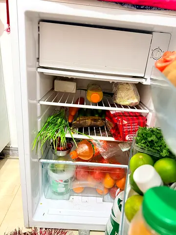 Small single-door fridge in working condition - ideal for bedroom or office