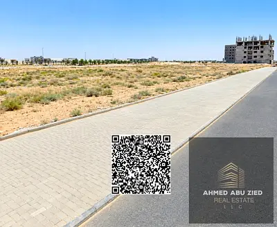 Residential and commercial land (G+5) for sale—second lot off the main street, across from Al-Bahia; freehold