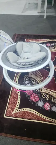 Baby walker with padded seat — light grey, good condition