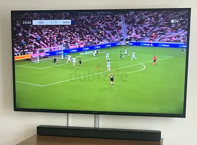 55" SONY BRAVIA Wall-Mounted TV (Good Working Condition) along with Sony Sound Bar and LG DVD player