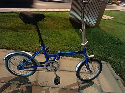 Blue folding city bike - compact, lightly use