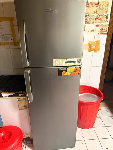 Used double-door refrigerator - silver, good working condition