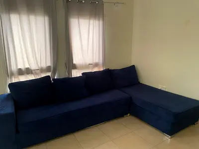Blue L-shaped corner sofa - good condition