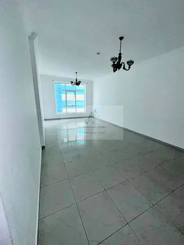 Spacious 2-Bedroom Apartment with Maid Room for Rent in Al Qasba, Free Parking, Free Maintenance an