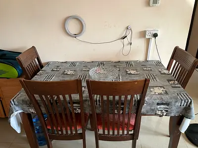 Solid Wood Dining Table with 4 Chairs - Good Condition