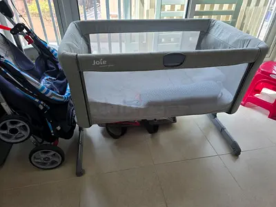 Joie bedside co-sleeper crib in grey - gently used