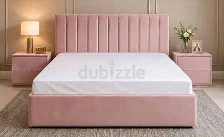 Queen pink velvet upholstered bed with matching bedside tables