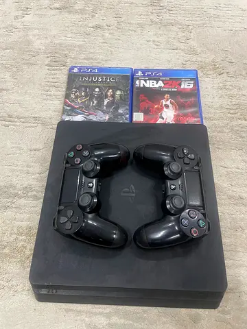PS4 Slim with 2 Controllers and 2 Games - Good Working Condition